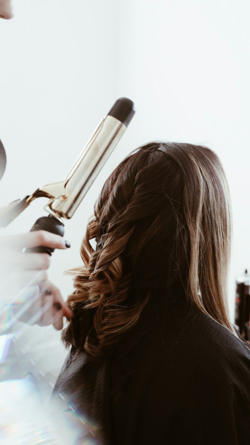 Close-up of a salon treatment and client care moment